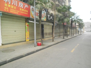 The stores along our alleyway sidestreet were closed up tight during the first few days of Spring Festival.