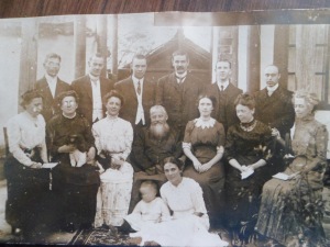 The China Inland Mission Canadian Methodist missionaries, including Luzhou church founders, Rev. Charles Joliffe (standing third from the left) and his wife, Gertrude (seated second from right, looking down at child)